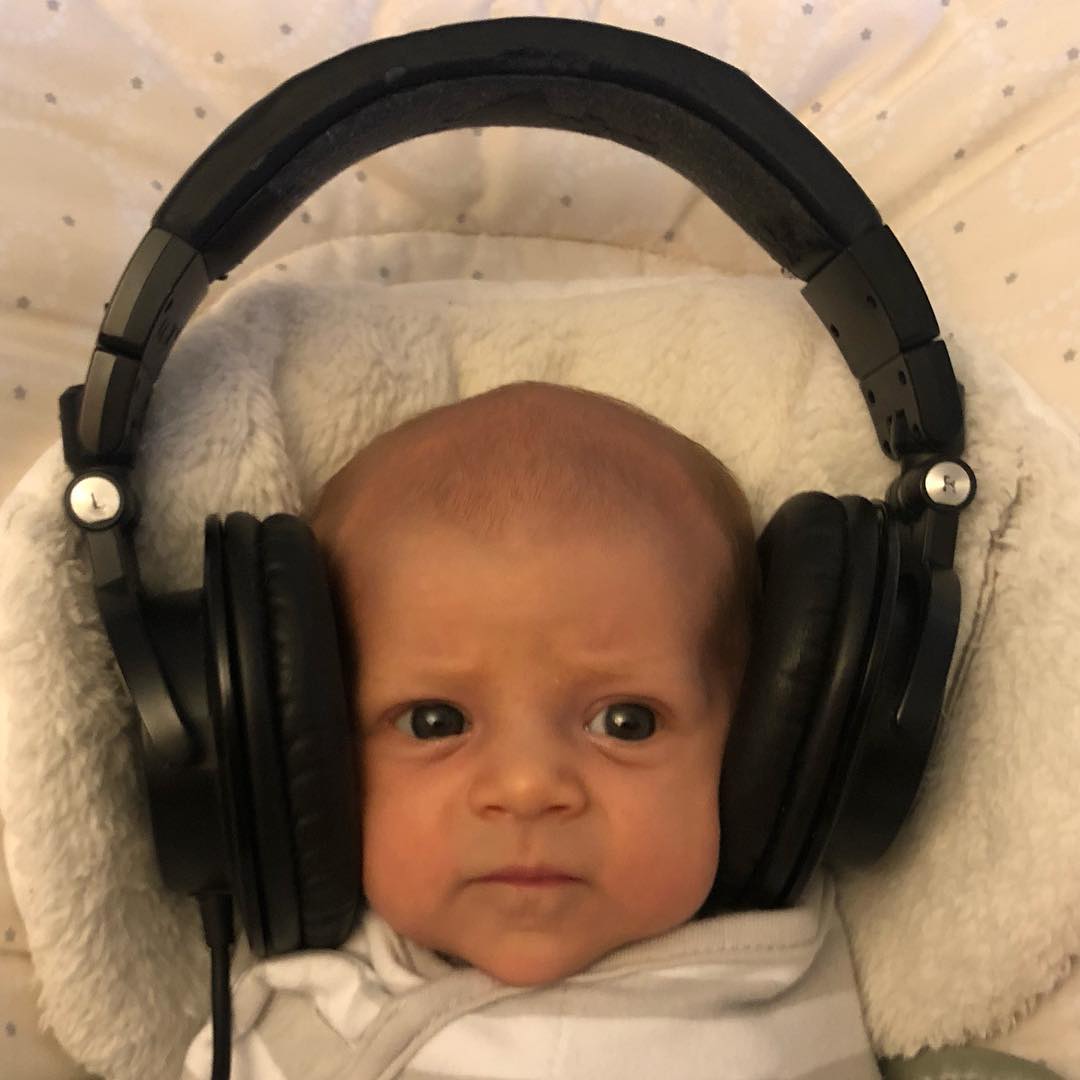 Listening on daddy’s headphones :) DJ Iz in the house!