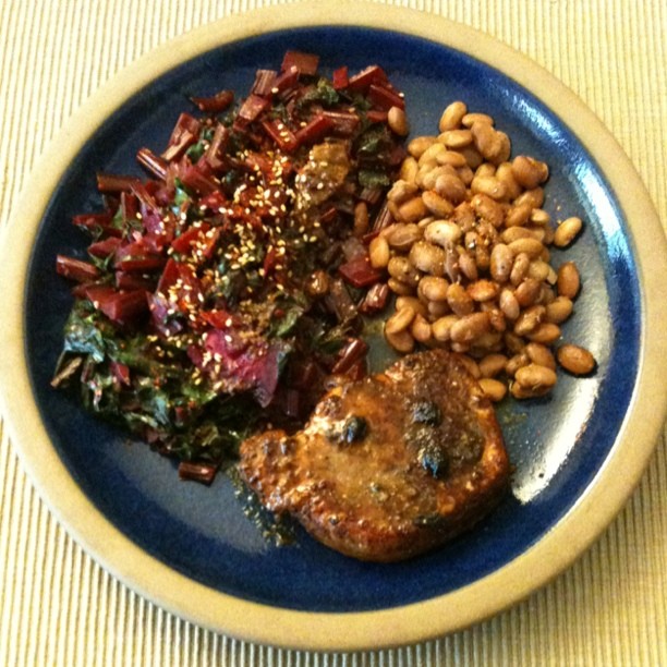 Pork loin, pinto beans and beet greens